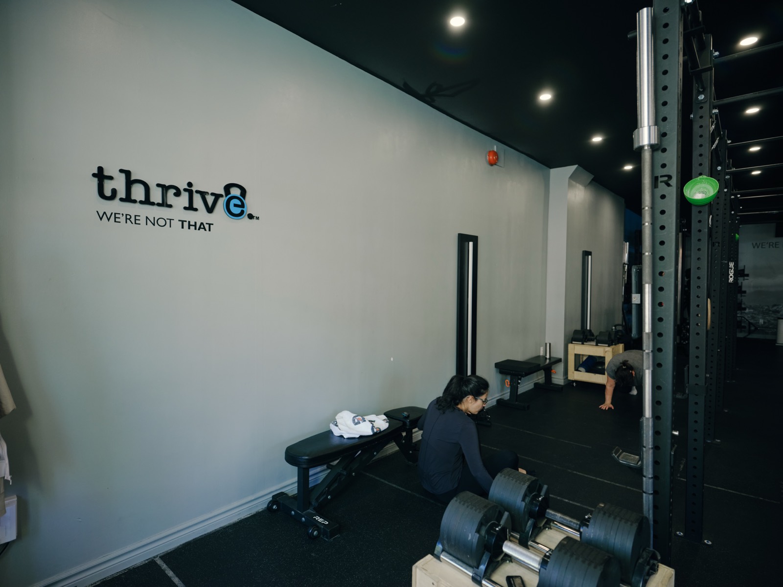Thrive Fit: a coach working with members during a semi-private session