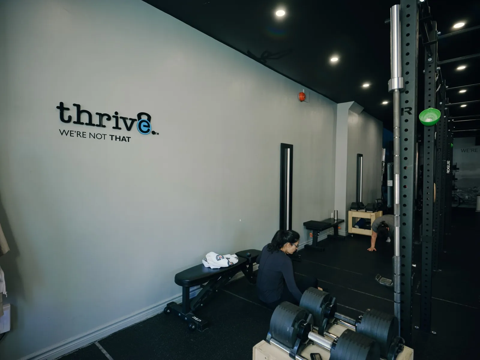 Thrive Fit: a coach working with members during a semi-private session